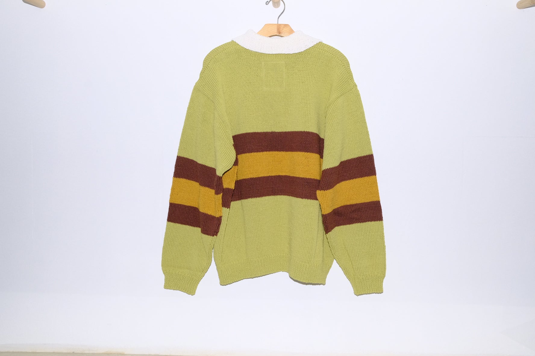 hand knitting rugby shirt in tea green