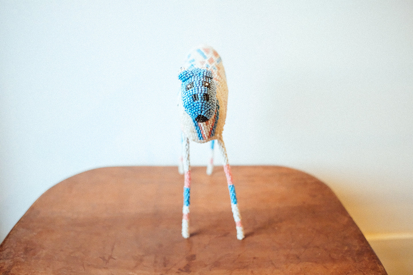 beaded long legged horse